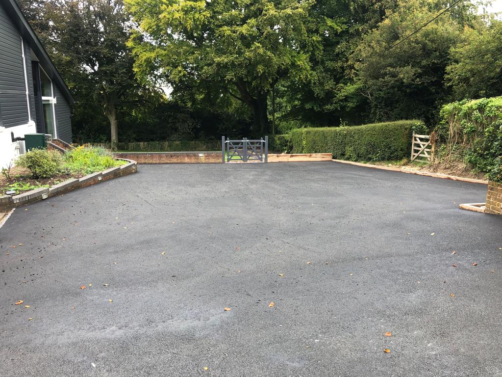 This is a photo of a bitumen driveway which is in the process of being installed by Gatton Surfacing Solutions